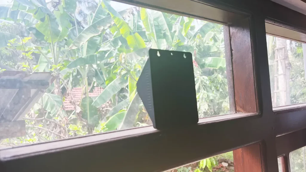 house side view of motion activated solar light near the window