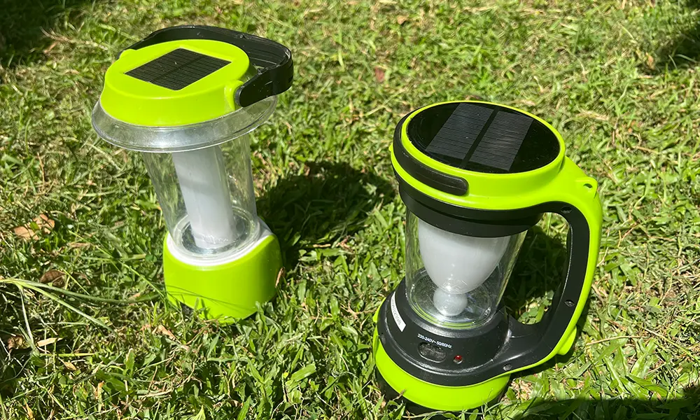 my two portable solar lights charging under the sun